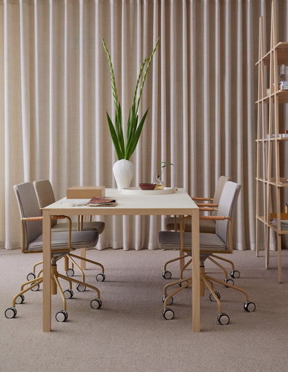 Swedese Stella Upholstered Armchair Wheelbase